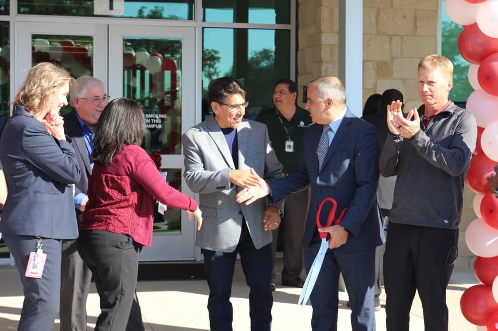 ribbon cutting with balloons