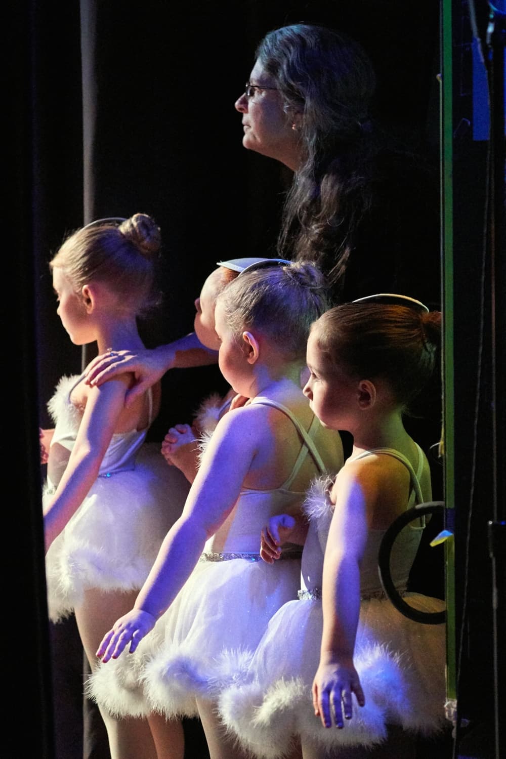 Dancers await backstage with founding director Jennifer Dulin for a performance. (Courtesy Texas Youth Ballet) 