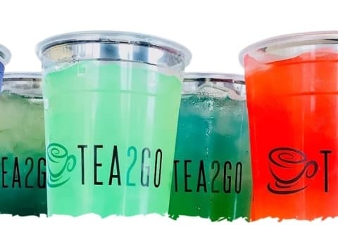 Energy drinks of different colors in cups