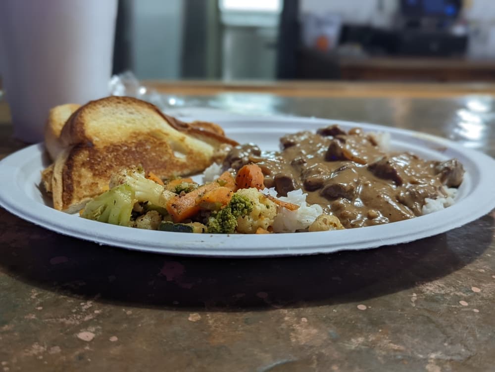 Beef tips with gravy over rice and vegetables ($10.75) is one of the specials of the week, which rotate every Thursday. (Jishnu Nair/Community Impact Newspaper)