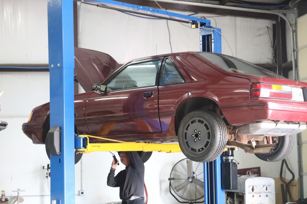 StreetMod Designs works on a 1984 Ford SVO, owned by a repeat customer that lives in Oklahoma. The car is gettign a rebuilt engine and performance suspension. (Kaushiki Roy/Community Impact Newspaper)