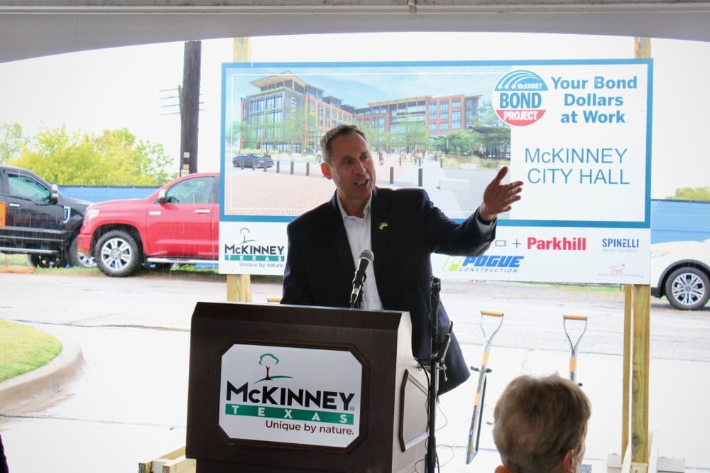 City Manager Paul Grimes gave remarks at the event that included a list of the various city offices that will be consolidated due to the construction of the new city hall. (Shelbie Hamilton/Community Impact)