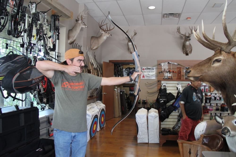 A full draw refers to when the archer fully draws the arrow before releasing it. (Sumaiya Malik/Community Impact Newspaper)