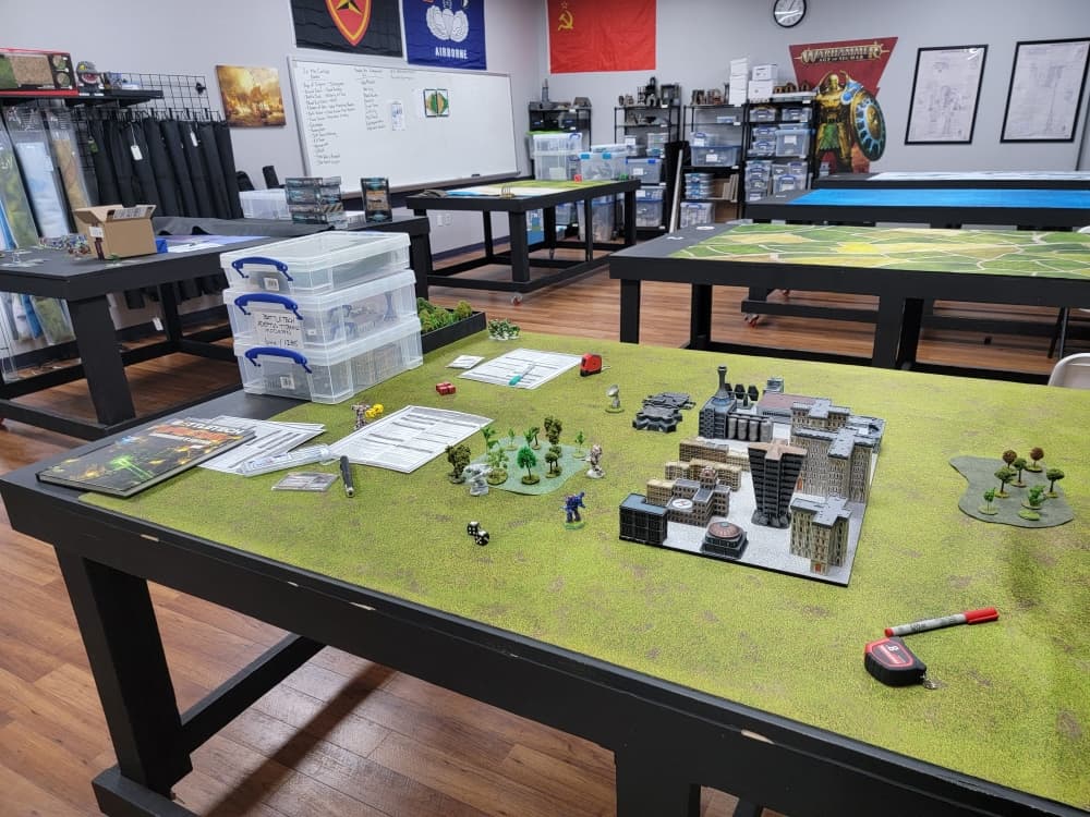 A table is set up for battle in the war games wing of the store.