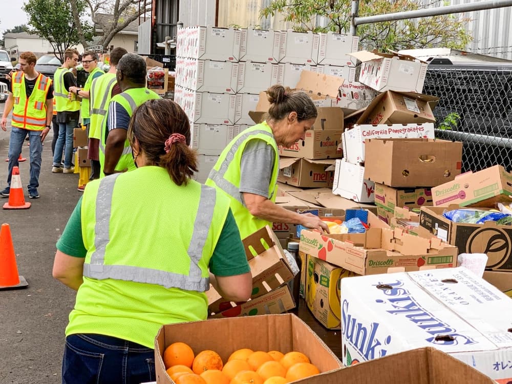 Volunteers sorting donations