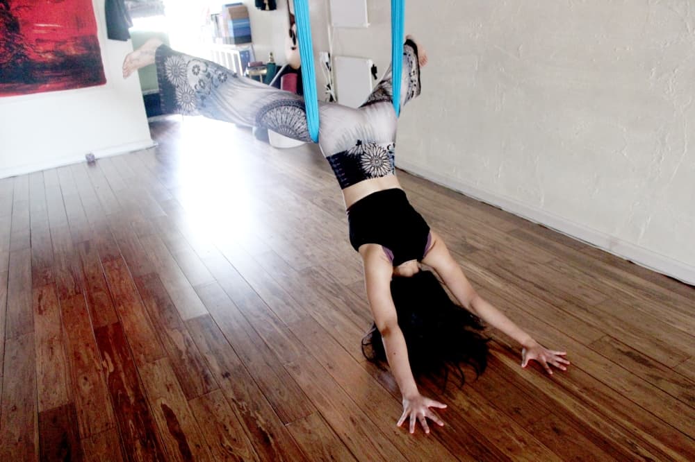 Ying Yoga Studio offers a variety of classes, including Aerial Fly Yoga. (Zacharia Washington/Community Impact)