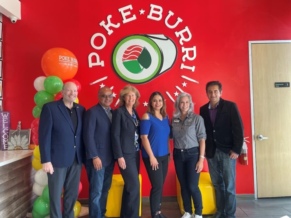 On Oct. 27, Poke Burri and Lifting Noodles held its grand opening with a ribbon-cutting from the Fort Bend Chamber of Commerce. Owners Shawn and Vanshika Vipin and members of the Sugar Land City Council were in attendance. (Courtesy Poke Burri and Lifting Noodles)