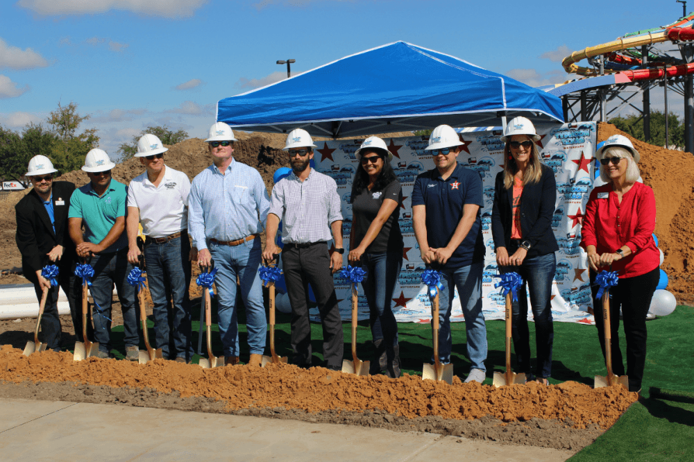 Typhoon Texas General Manager Matthew Girocco stands with water park officials as well as members of the Katy Area Chamber and Katy City Council at Typhoon Junior's groundbreaking Nov. 7. (Asia Armour/Community Impact)