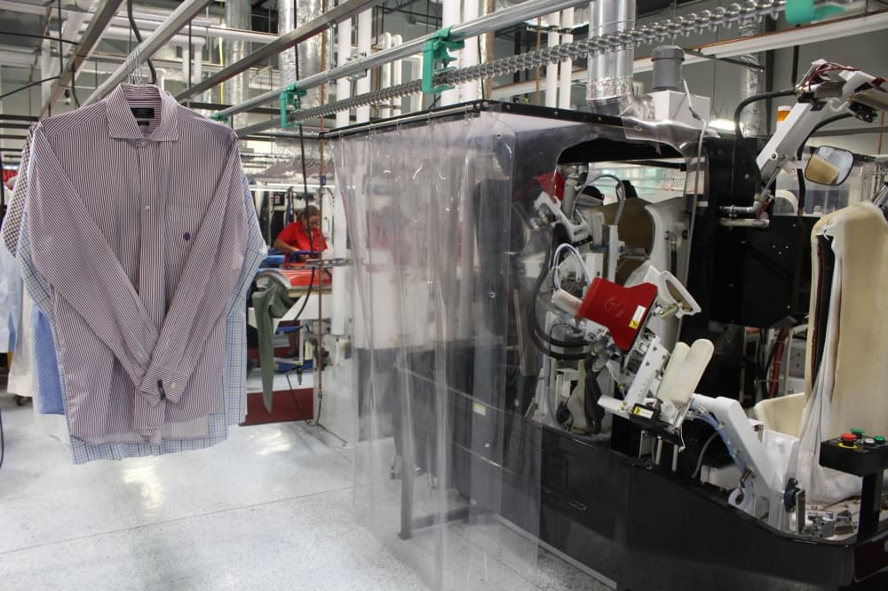 Andy’s Cleaners uses an automated process for organizing clients’ clothing. (Andrew Christman/Community Impact)