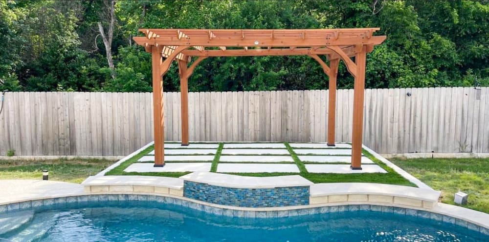 pergola beside swimming pool