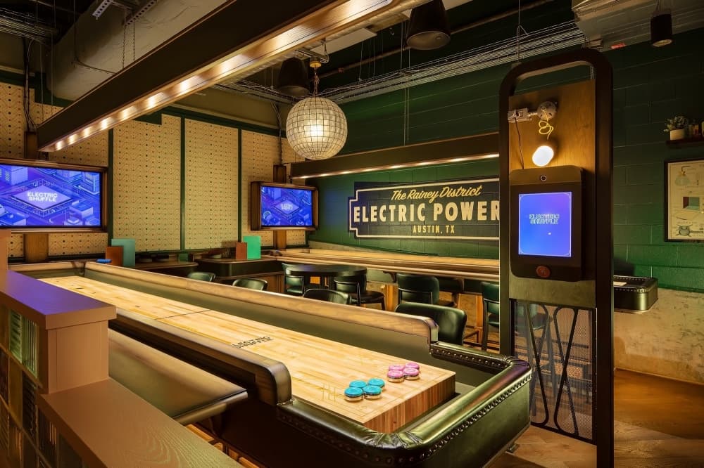 Electric Shuffle opens downtown; SH 45 gap road project causes friction
