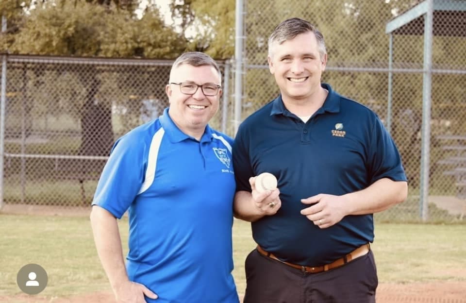 Cedar Park Mayor Jim Penniman-Morin (right) joins CPYL President Dennis Goett (left) on the CPYL fields. (Courtesy Cedar Park Youth League) 