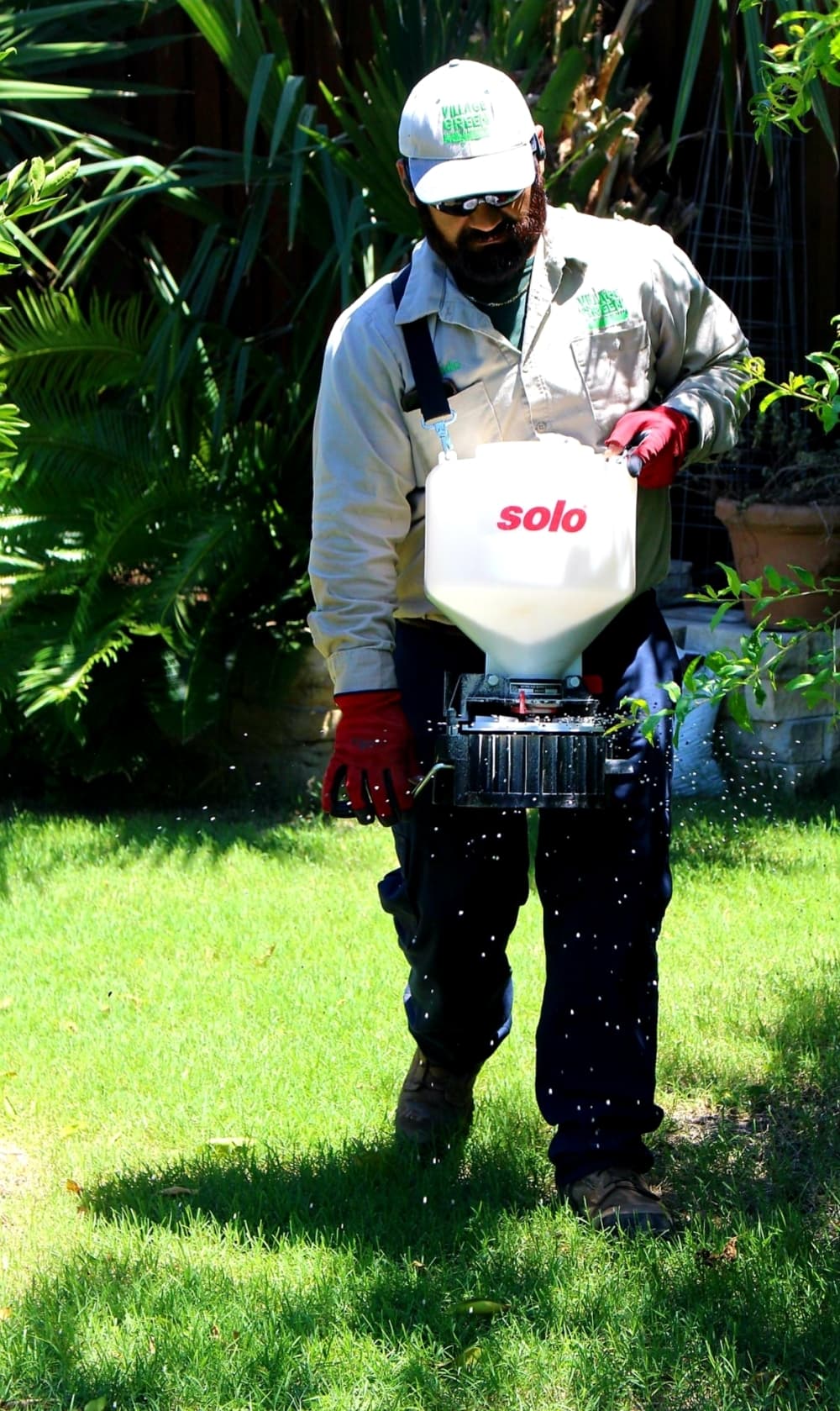 Village Green Lawn & Landscape staff member Orlando Pacheco.