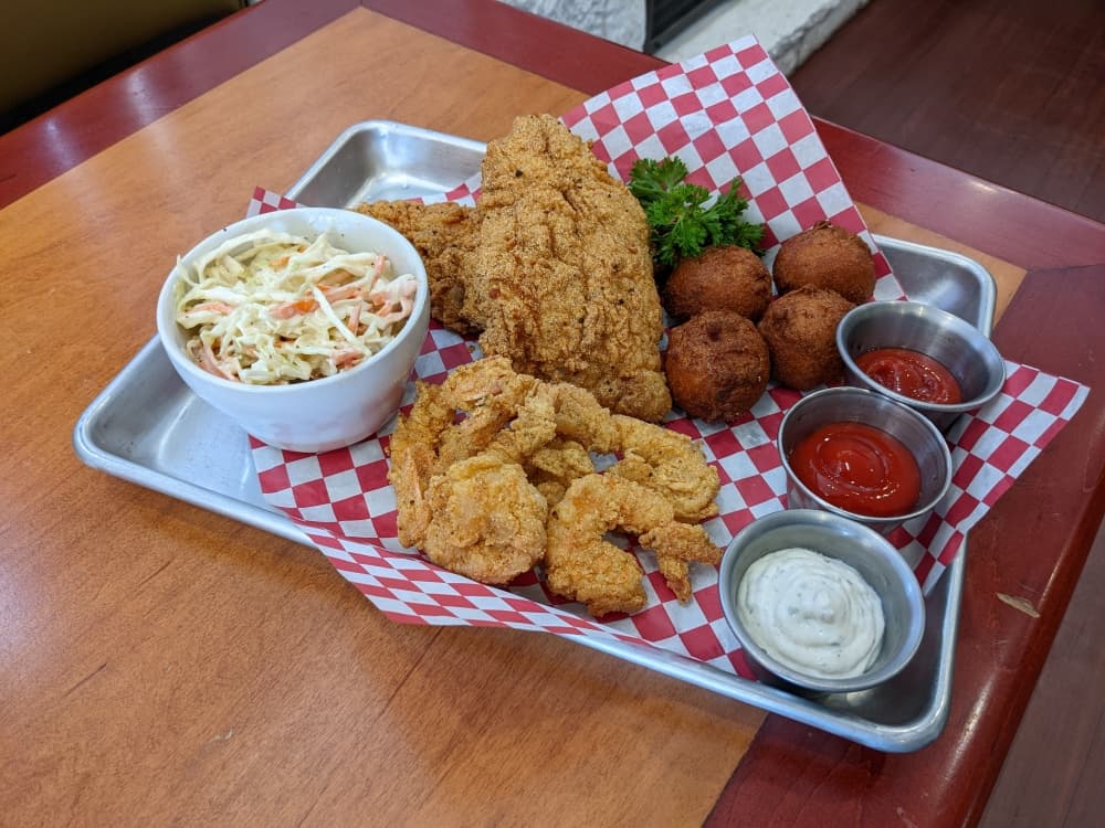 The shrimp and catfish ($18.99) comes with hush puppies and an additional side. 