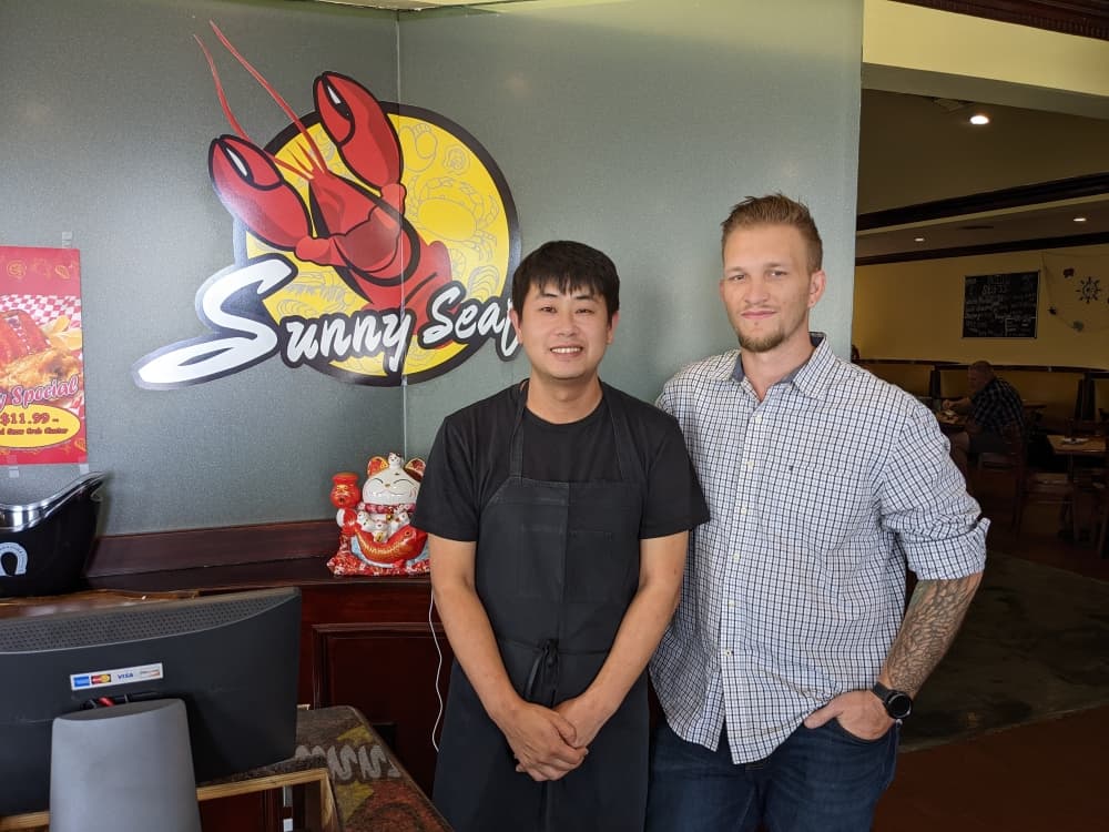 David Sun (left) opened Sunny Seafood over the summer. Sun's friend, Brandon Bowling (right), manages the restaurant. 