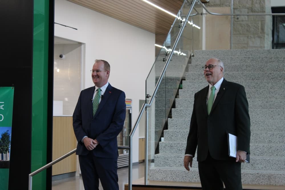 Frisco Mayor Jeff Cheney and University of North Texas President Neal Smatresk spoke to university and city officials Nov. 15 before the tour. (Colby Farr/Community Impact)