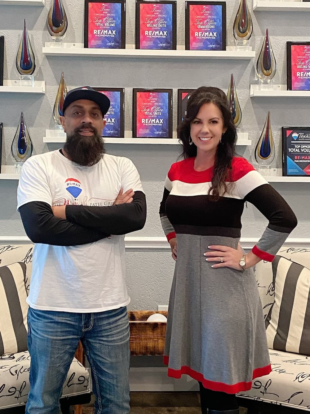 Nimesh Patel (left) is the owner of the newly merged RE/MAX Fine Properties of Sugar Land, which brings Angie Middlebrooks (right) and her team under its roof. (Courtesy RE/MAX Fine Properties of Sugar Land)