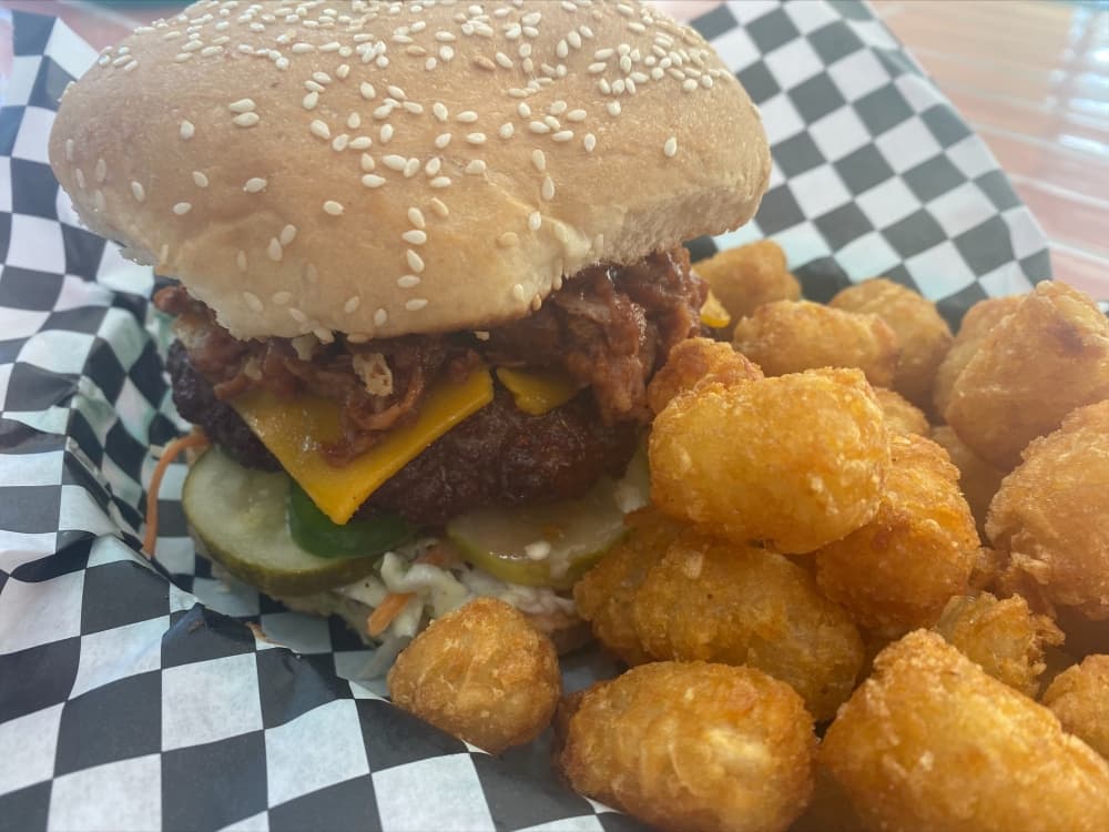 The Build a Burger Combo ($14.50) comes with tater tots or fries and a real cane sugar soda. (Courtesy of Magnolia Eats & Treats)