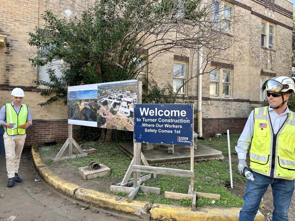 A welcome sign at the construction site