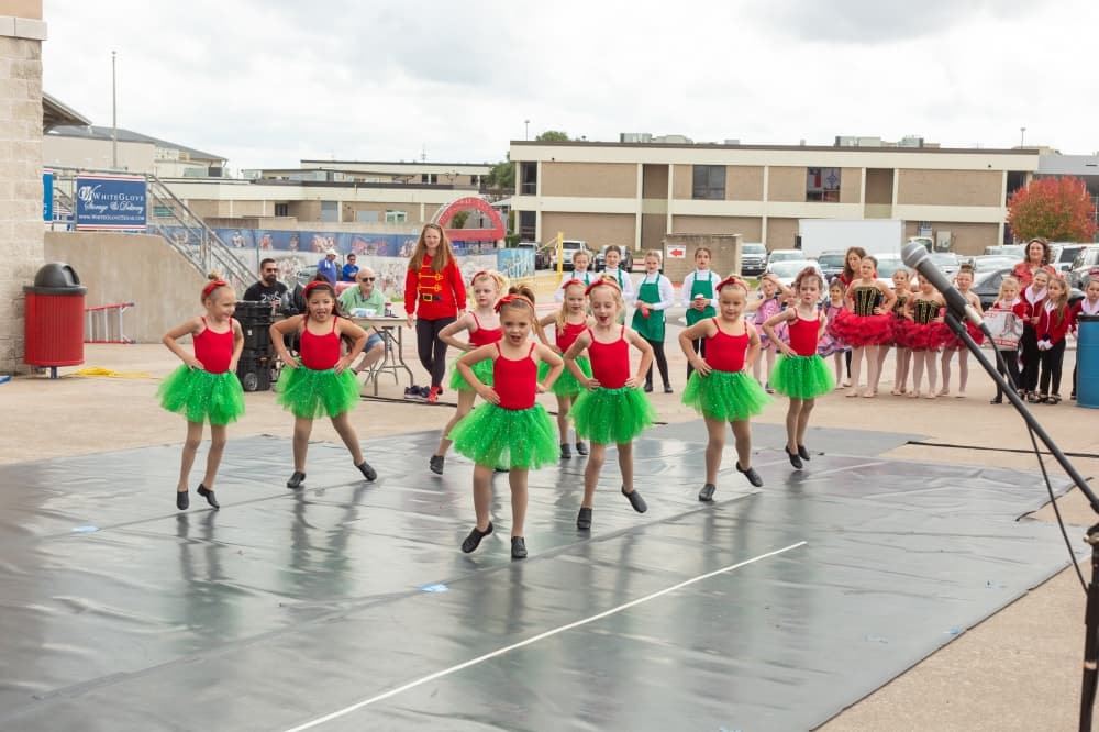 kids on stage in holiday costumes