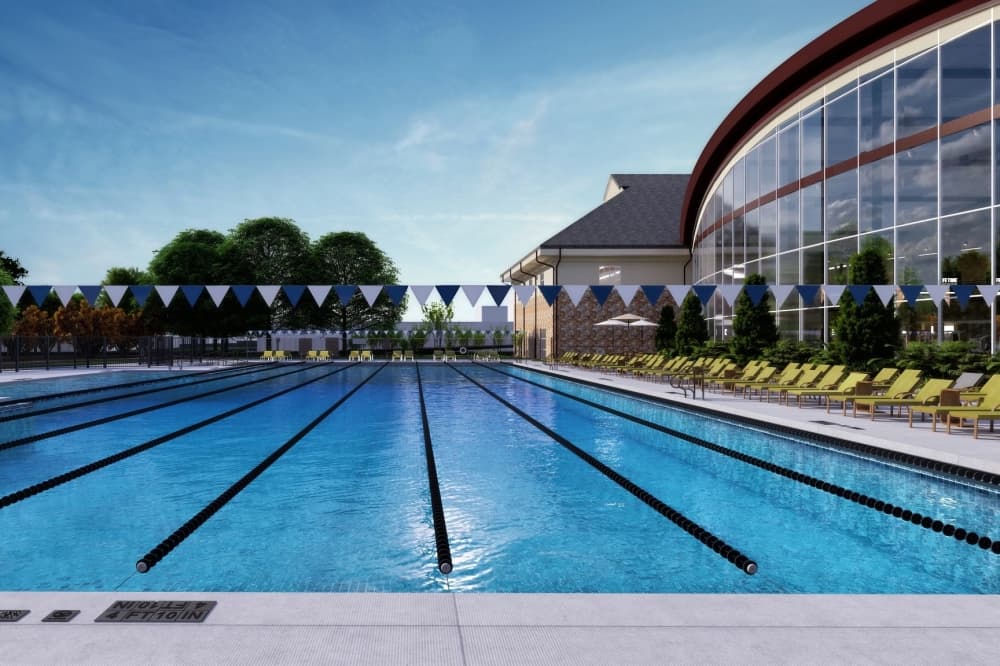 The facility includes a 50-meter outdoor Olympic-sized swimming pool. (Renderings courtesy Life Time)