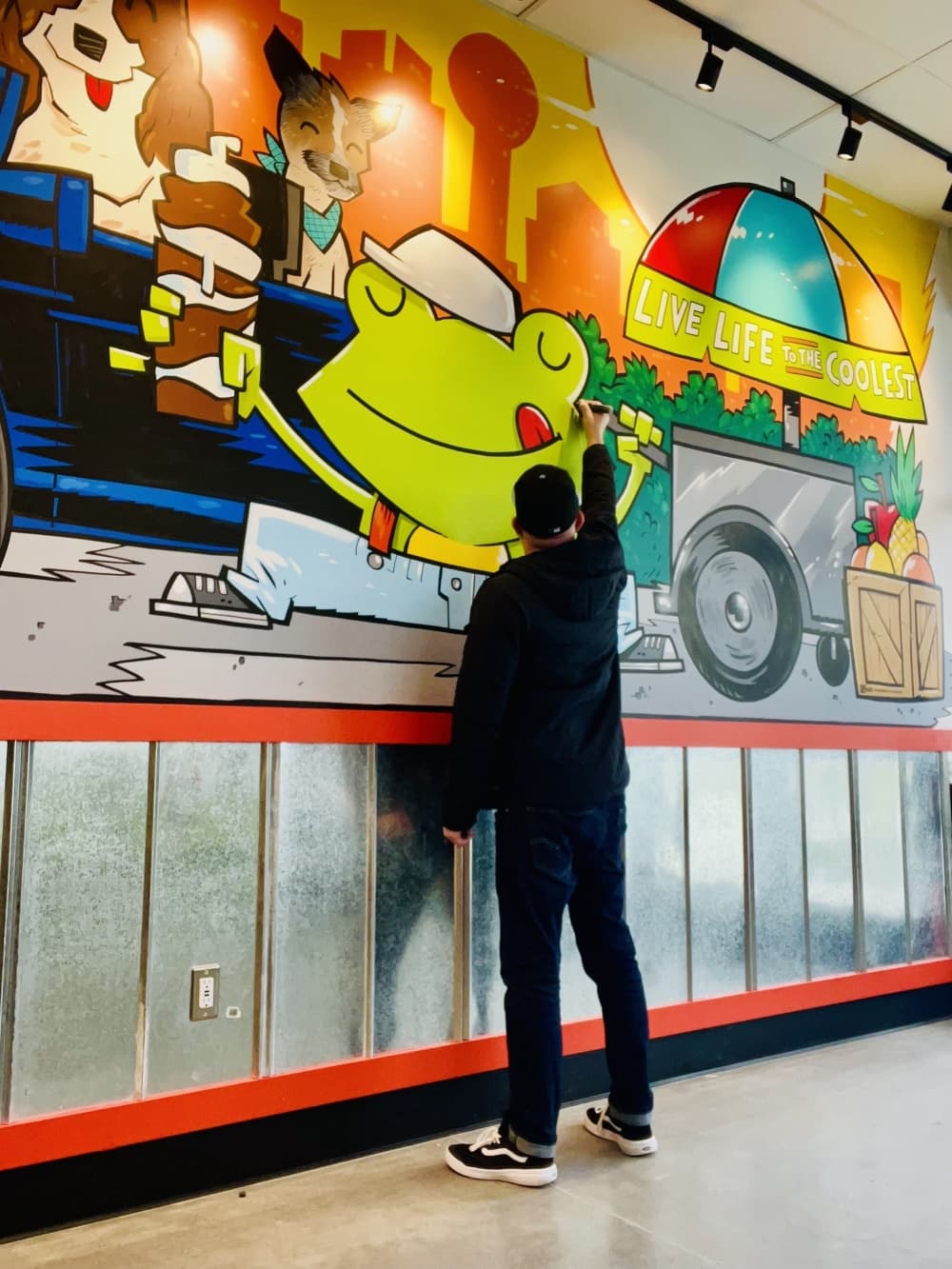 The Frisco location features a mural by artist Justin Peterson and features the owner's dog, Daisy and her friends' dogs, Butters and Ted as well as the Frisco water tower, the Dallas skyline and a tribute to the founder of Jeremiah's first Italian ice cart. (Courtesy Jeremiah's Italian Ice)
