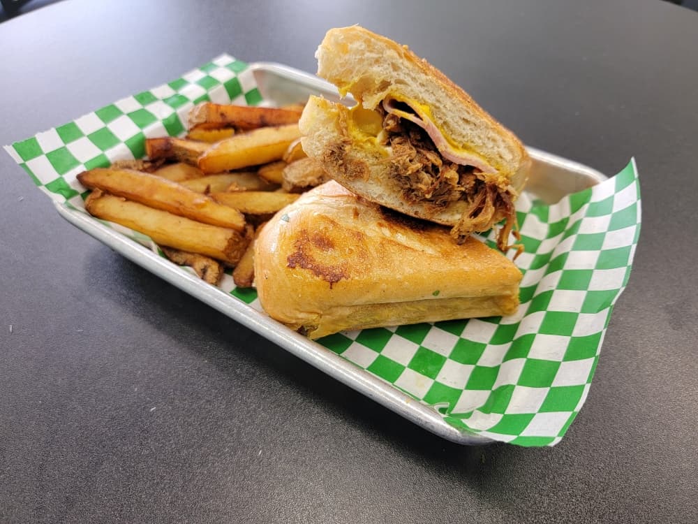 The Havana Sandwich ($11.95) comes with ham, swiss cheese, pickles, mustard and is served with a side of fries.
