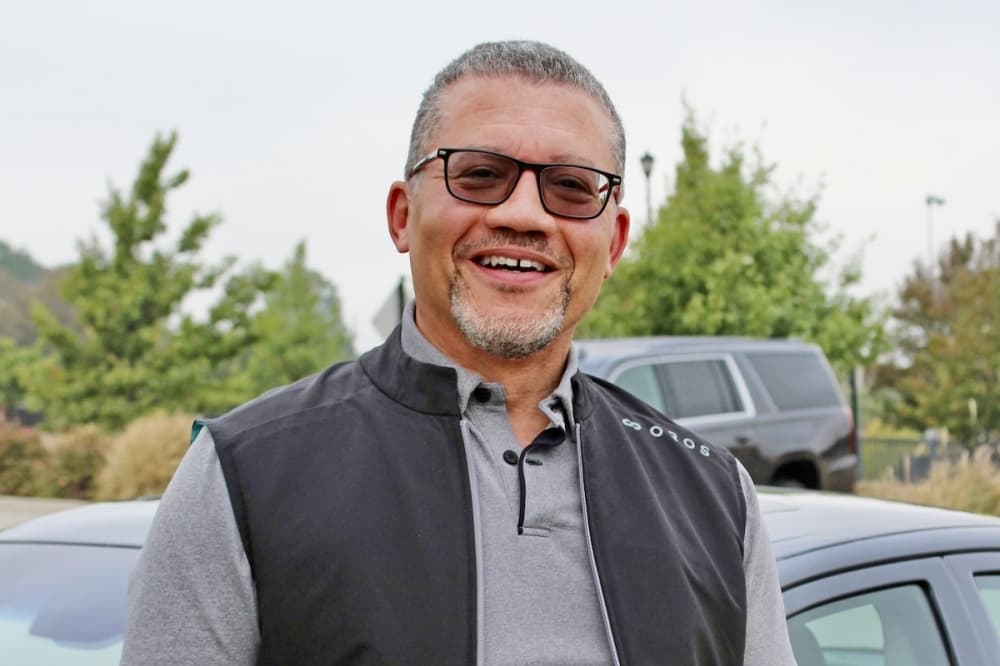 man in glasses with grey shirt