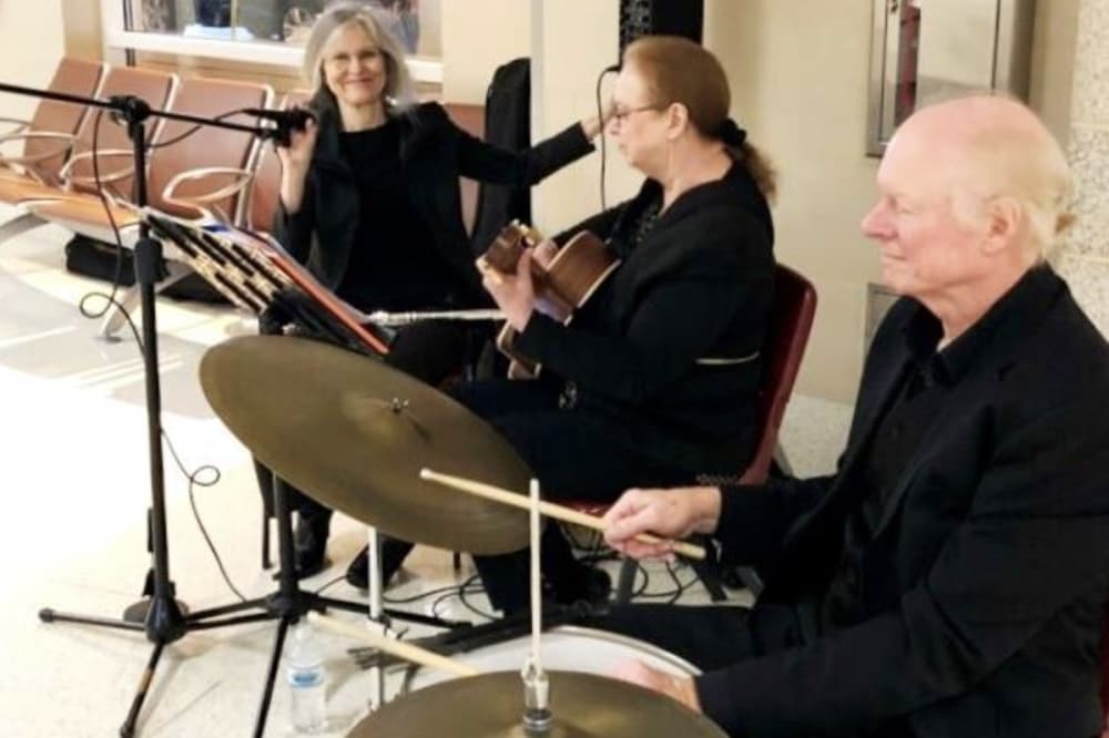 Local musicians play holiday tunes at San Antonio International Airport