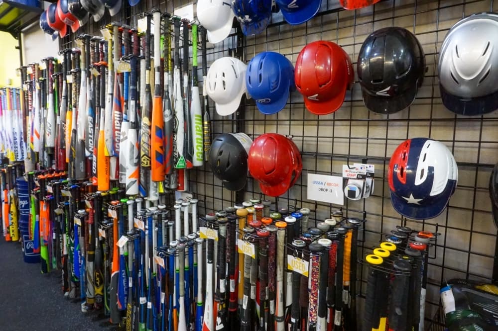 Play It Again Sports has a variety of softball and baseball equipment and accessories for all ages. (Sierra Martin/Community Impact)