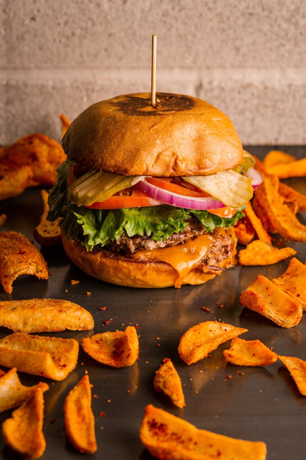 The picture attached is a different menu item, so the caption would need to be replaced with: The Gather Smashburger ($14) includes two 1/4 pound beef patties, cheddar cheese, lettuce, tomato, red onion, pickles and gather sauce on a grilled brioche bun. (Courtesy Gather Brewing Company)