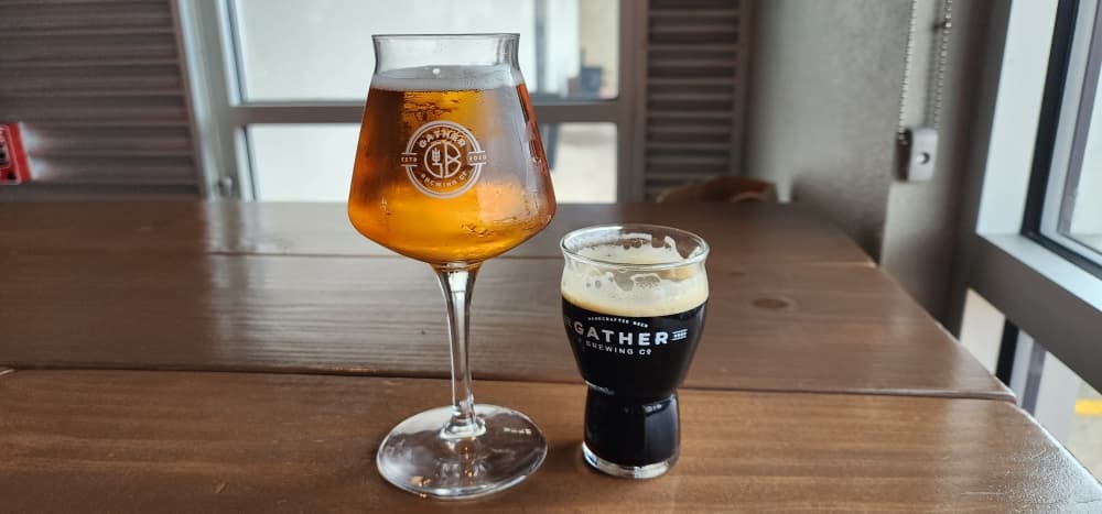 Gather Brewing Company offers a variety of beers made in house including Trilogy (left) and Stouts Honor (right). (Jarrett Whitener/Community Impact)