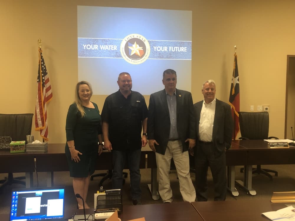 From left new and re-elected board members Janice Thigpen, Jonathan Prykryl, Jon Bouche, and Kenneth Earnest.
