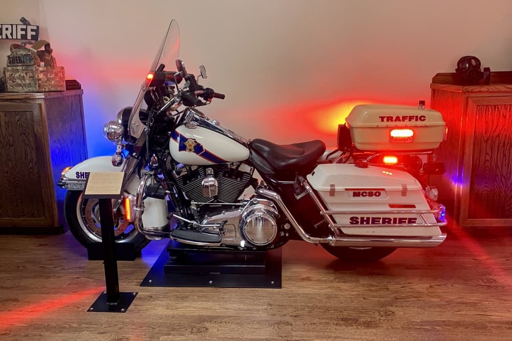 An old-school police officer motorcycle is on display at the new Montgomery County Sheriff's Office Museum in Conroe. (Cassandra Jenkins/Community Impact)