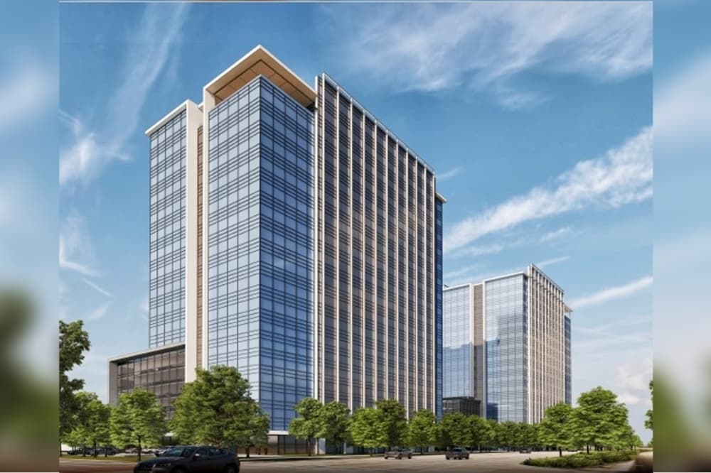 The zoning change would combine two undeveloped tracts into one with 500 multifamily units along the eastern half and two office towers along Dallas Parkway. (Rendering courtesy city of Frisco)