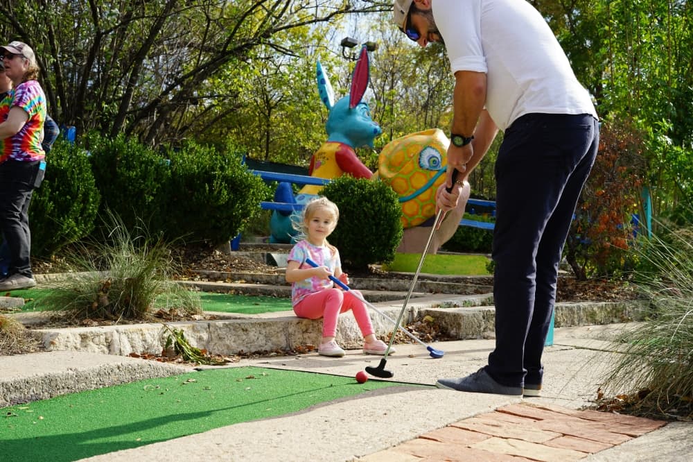 Massad said the low-technology at Peter Pan Mini Golf has helped create an environment for people of all ages to enjoy the course. (Katy McAfee/ Community Impact) 