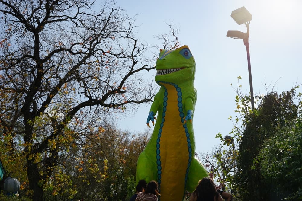 Originally, the T-Rex at Peter Pan Mini Golf was painted with muted colors to look like an actual dinosaur, and Dismukes explored the idea of adding speakers in the sculpture so it would roar every several minutes. (Katy McAfee/ Community Impact) 
