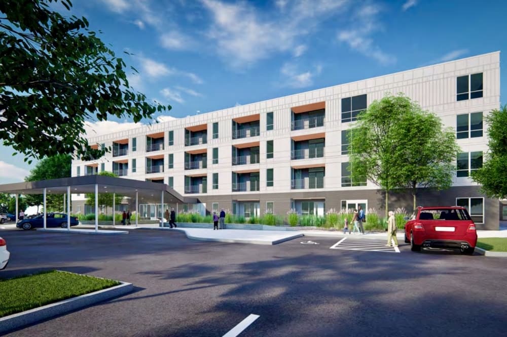 Renderings show surface parking lots and easy access parking spots on the four-story apartment development. (Courtesy DMA Development Company, LLC.)

