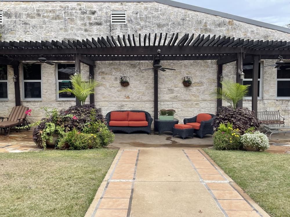 The back patio offers relaxation for visitors. (Taylor Cripe/Community Impact)