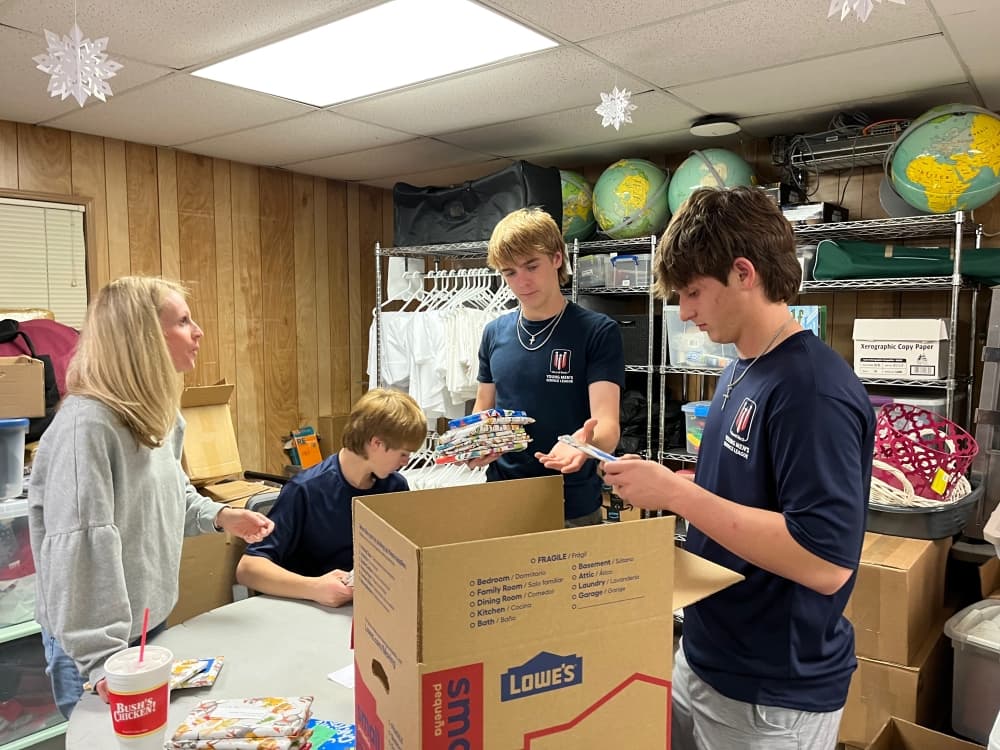 Students packed individually wrapped books for delivery to Title I Round Rock ISD schools. (Courtesy Kasey Baize)