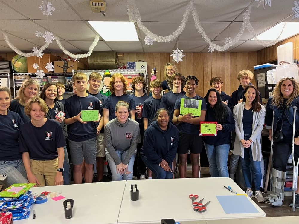 Young Men's Service League members wrapped 3,500 new books collected through a book drive to be given to Round Rock ISD students. (Courtesy Kasey Baize)