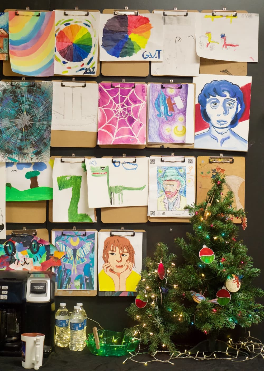Art created by students hangs on the wall at The Studio. (Cassandra Jenkins/Community Impact)