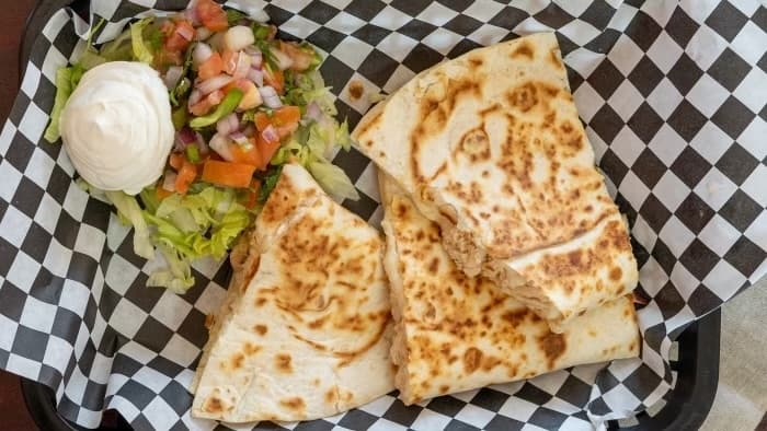 Quesadillas are served with a choice of meat, cheese and pico de gallo. (Courtesy Tacos El Gordo)