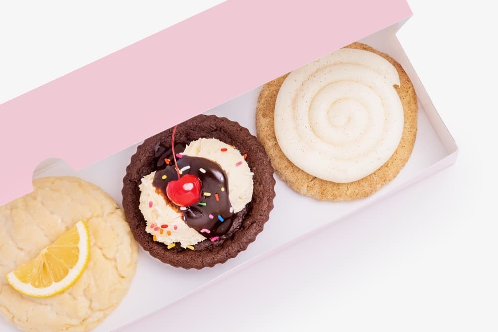 An array of unique cookies are available every week at Crumbl Cookies as well as staple flavors, such as chocolate chip and pink sugar. (Courtesy Crumbl Cookies)