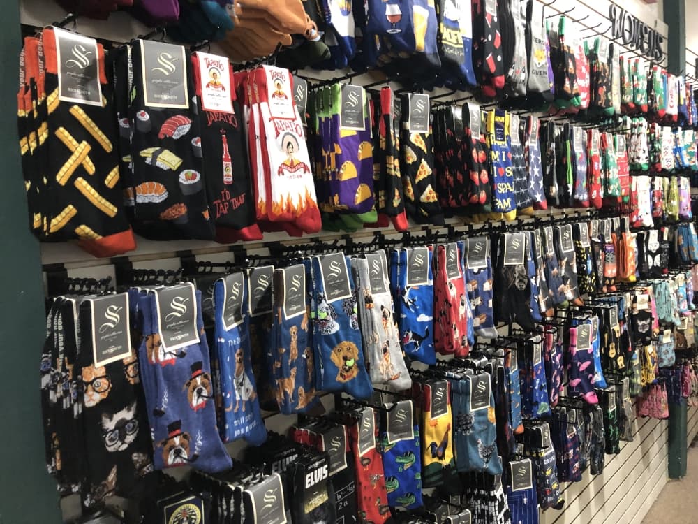 The back wall of Oh la la! features a variety of socks for men and women. (Cody Thorn/Community Impact)