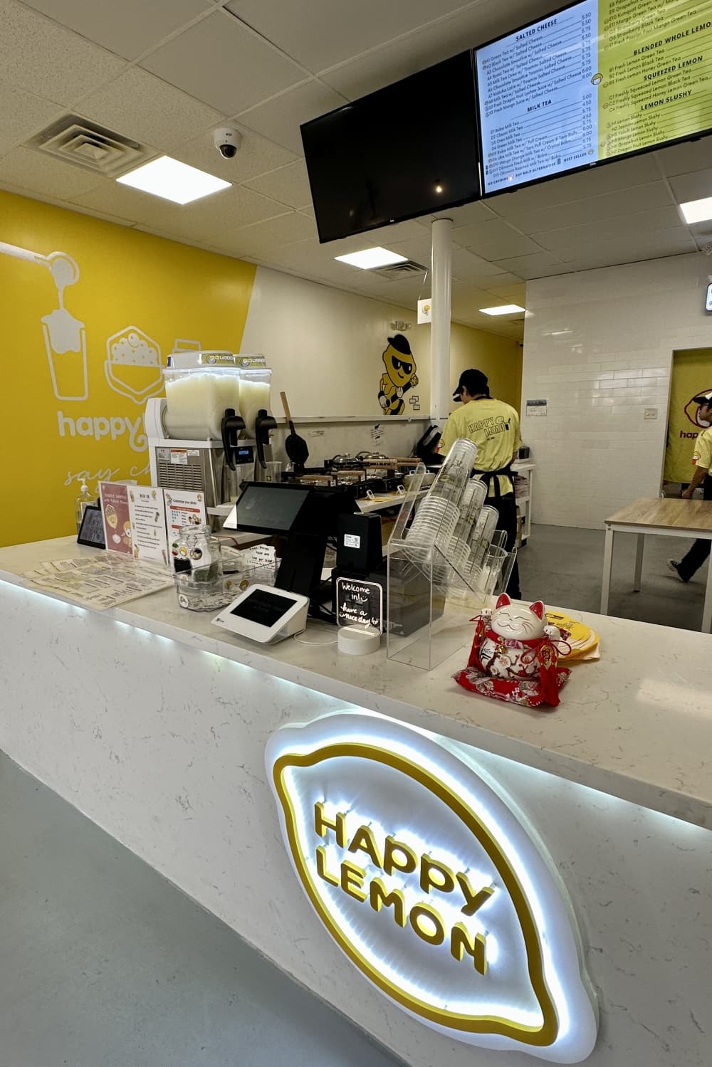 A counter with a sign