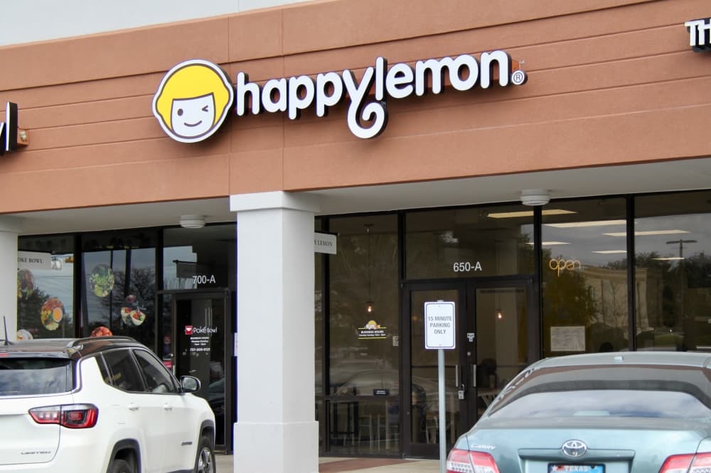 Name of business and two cars
