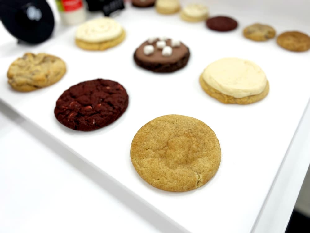 assorted cookies on white table