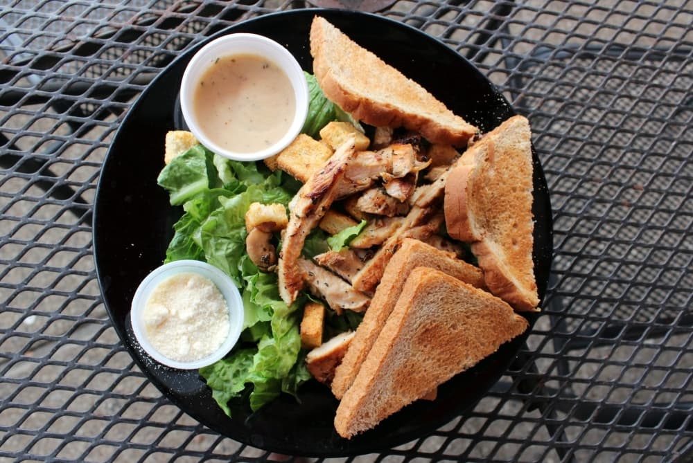 Classic Chicken Caesar Salad ($11.80) is made with grilled-to-order chicken that is marinated daily and topped with house-made Caesar dressing. (Karen Chaney/Community Impact)