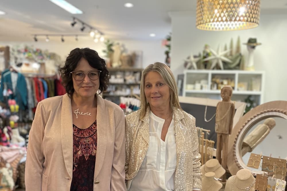 From left, Cheryl Gibbs and Glenda McMichaels partner to operate Blue Door Boutique. (Karen Harrington/Community Impact)